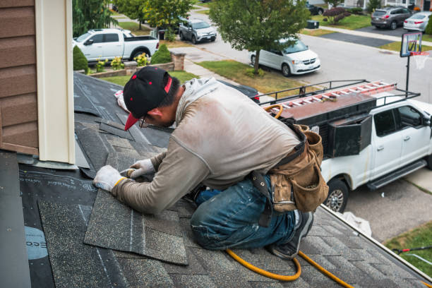 Professional Roofing technician working in Adamstown, PA